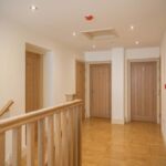 Communal stairs and hallway at Eskdale Sidings in Ruswarp