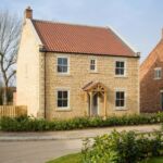 Stone built house at The View, a housing development in Thornton Le Dale by Dan Warrington Homes